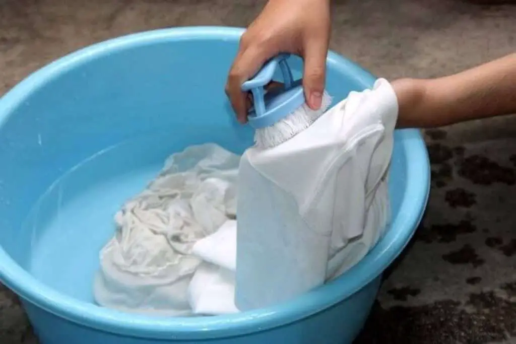 Wash Clothes With Baking Soda by hands