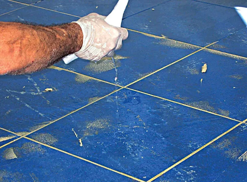 remove dried tile adhesive from tiles and fresh adhesive